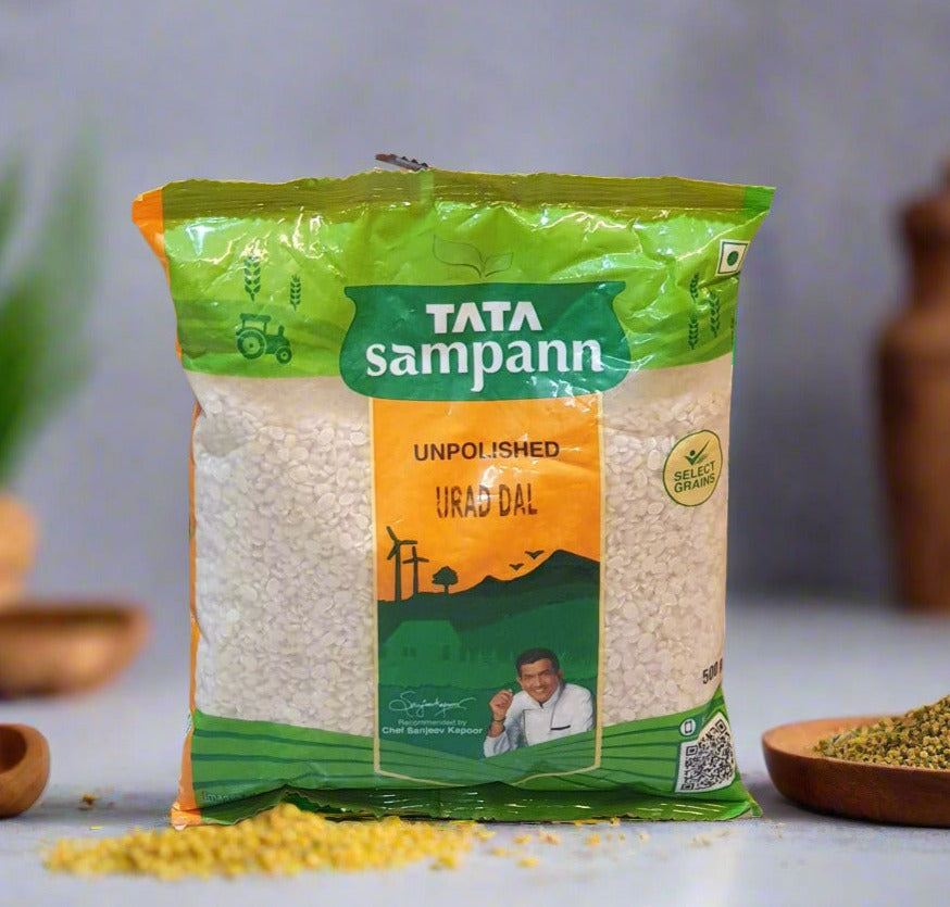 Tata Sampann unpolished urad dal package on a brown background